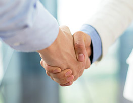 Close up of two people shaking hands