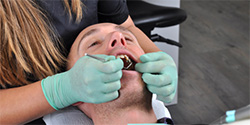 Man receiving dental treatment