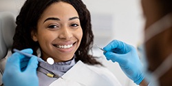 Man smiling with new dental crowns