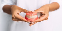 Closeup of man with dentures in Edmond smiling