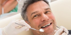 Man smiling in dental chair