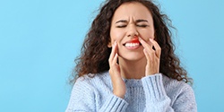 A woman suffering from gum inflammation
