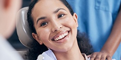 A woman preparing to receive dental care