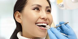 Woman receiving dental exam