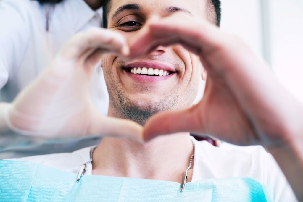 A man making a heart with his hands