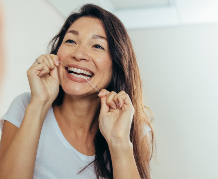 Woman flossing